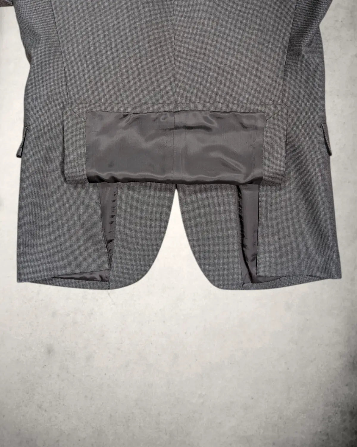 Seitenschlitz eines gebrauchten Herrensakkos von Canonico 