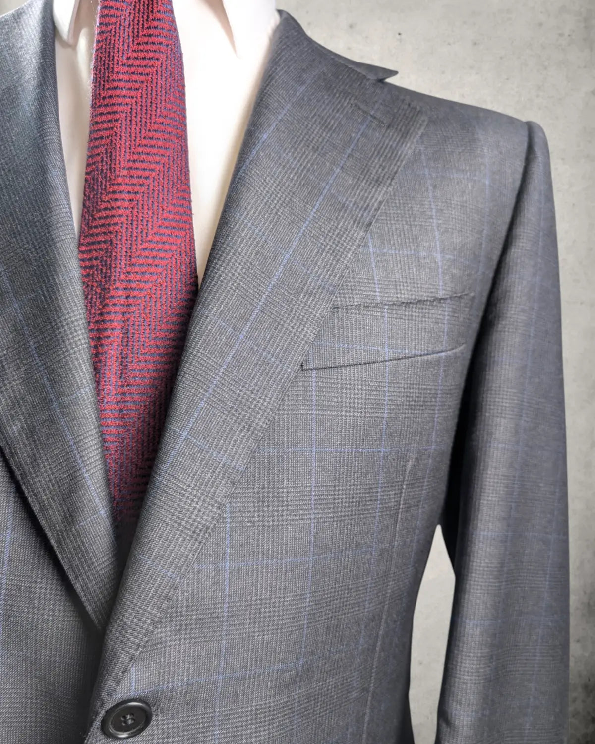 Revers eines Canali Herrensakkos mit Prince of Wales Muster in grau schwarz