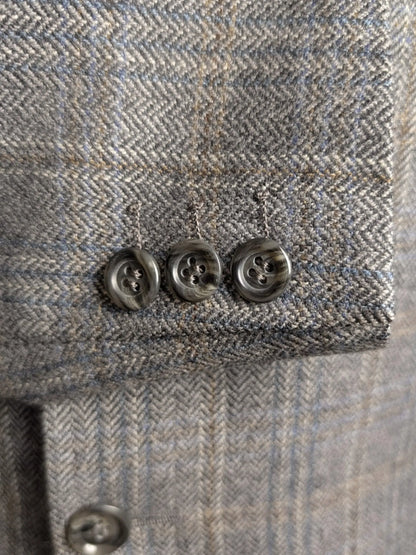Vintage-Sakko von Facis aus grauer Schurwolle mit feinem Muster, Größe 50C; drei Ärmelknöpfe.
