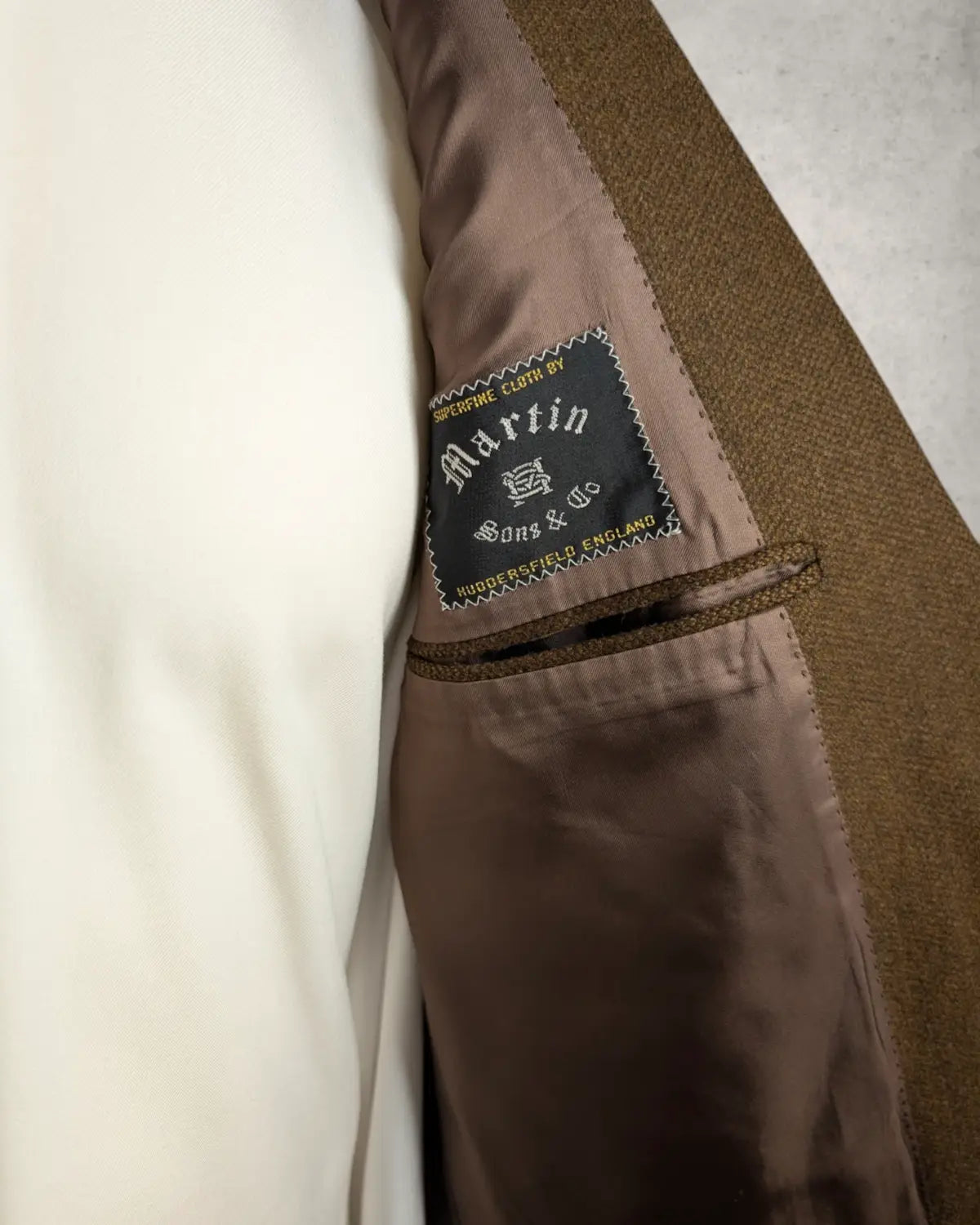 Martin Sons and Co Huddersfield Etikett in einem braunem vintage Herrensakko 