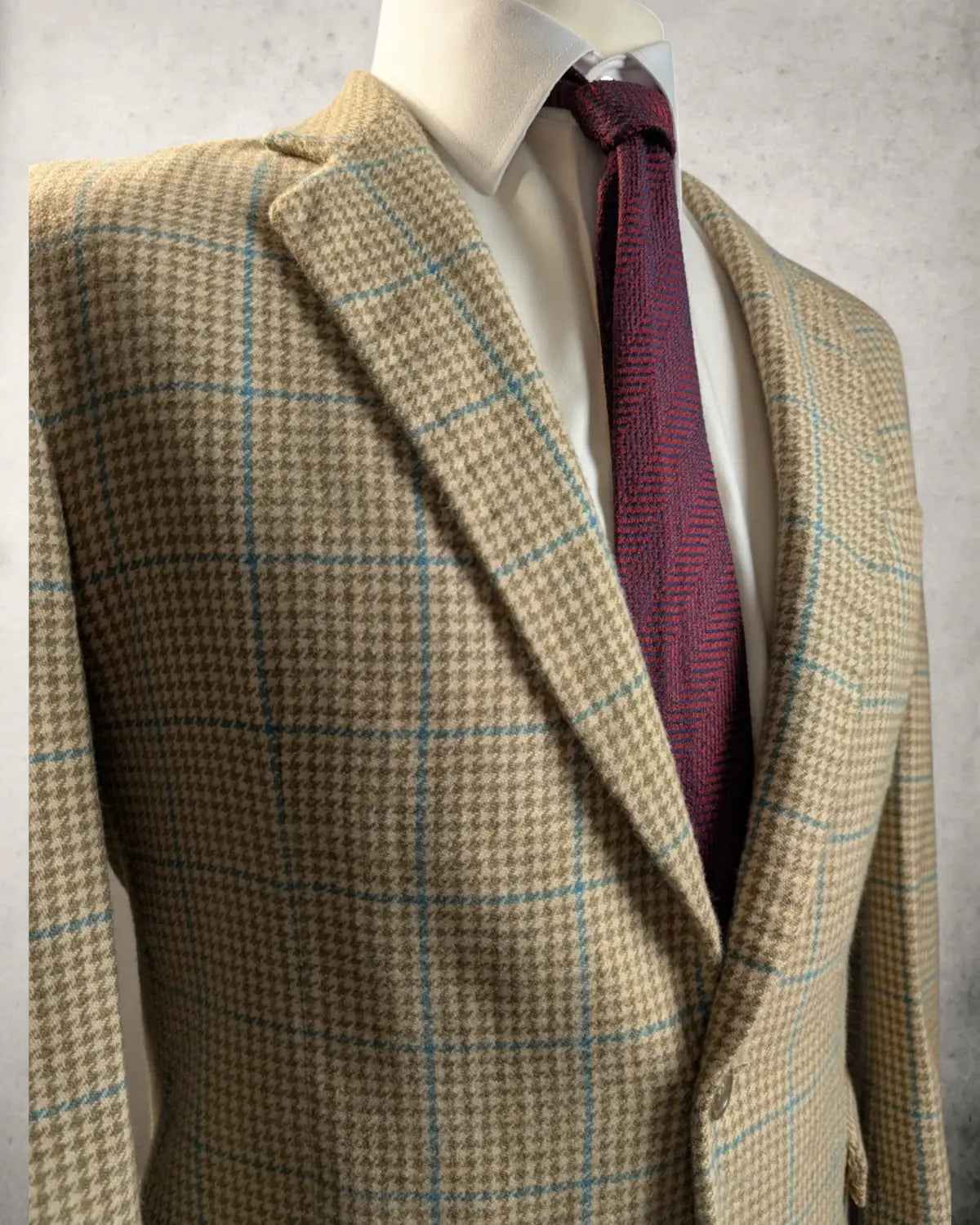 Herrensakko aus reiner Wolle von Lanificio Fedora. Windowpane Muster in schönen Erdtönen.